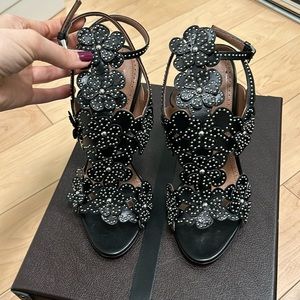 Excellent condition ALAIA black heels. Stud flower appliqués. Leather. Size 38.5